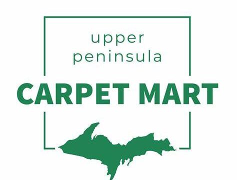 Carpet Mart over a green map of the Upper Peninsula